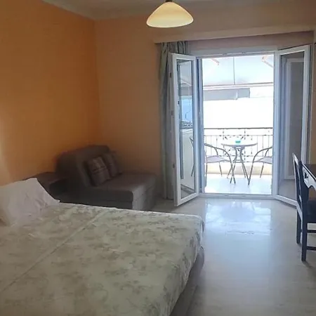 Logan's Lägenhetshotell Nidhrion